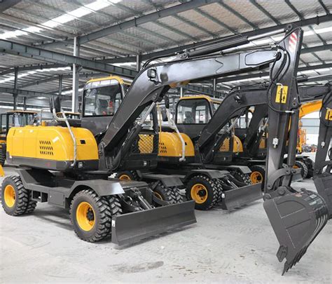 small wheeled excavator|rubber tired excavators for sale.